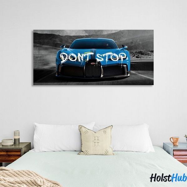Картина машина Bugatti блакитного кольору на сірих дорогах на полотні 11718 фото