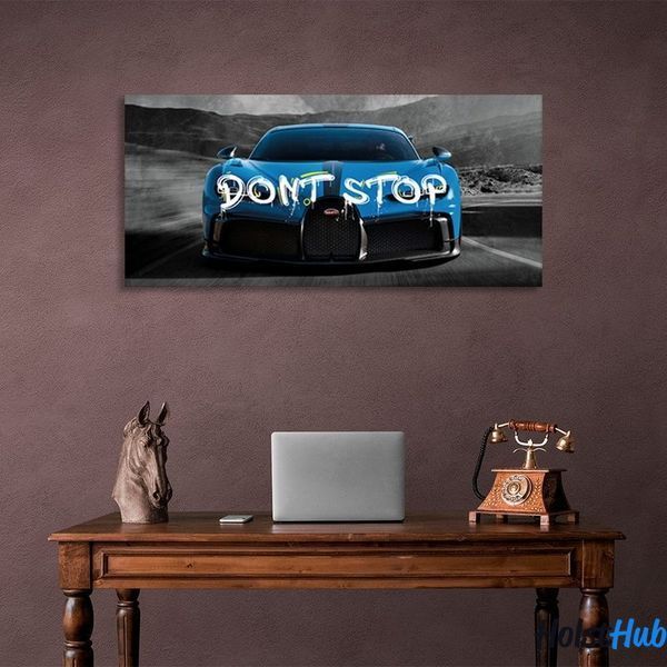 Картина машина Bugatti блакитного кольору на сірих дорогах на полотні 11718 фото